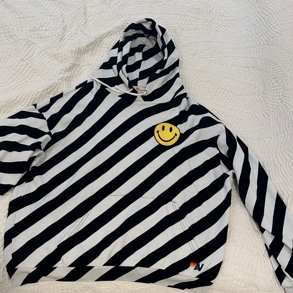 Aviator Nation Black & White Diagonal Stripe Hoodie with Yellow Smile Patch